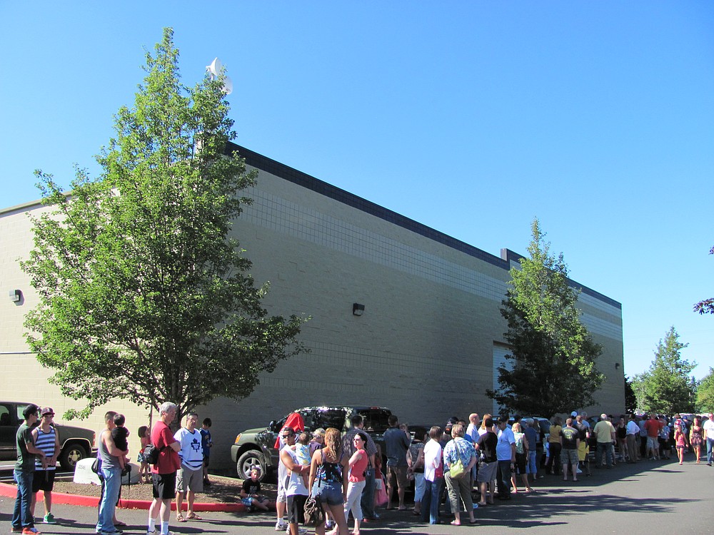 A line wraps around the Mountain View Ice Arena in Vancouver Wednesday, to see the Stanley Cup.