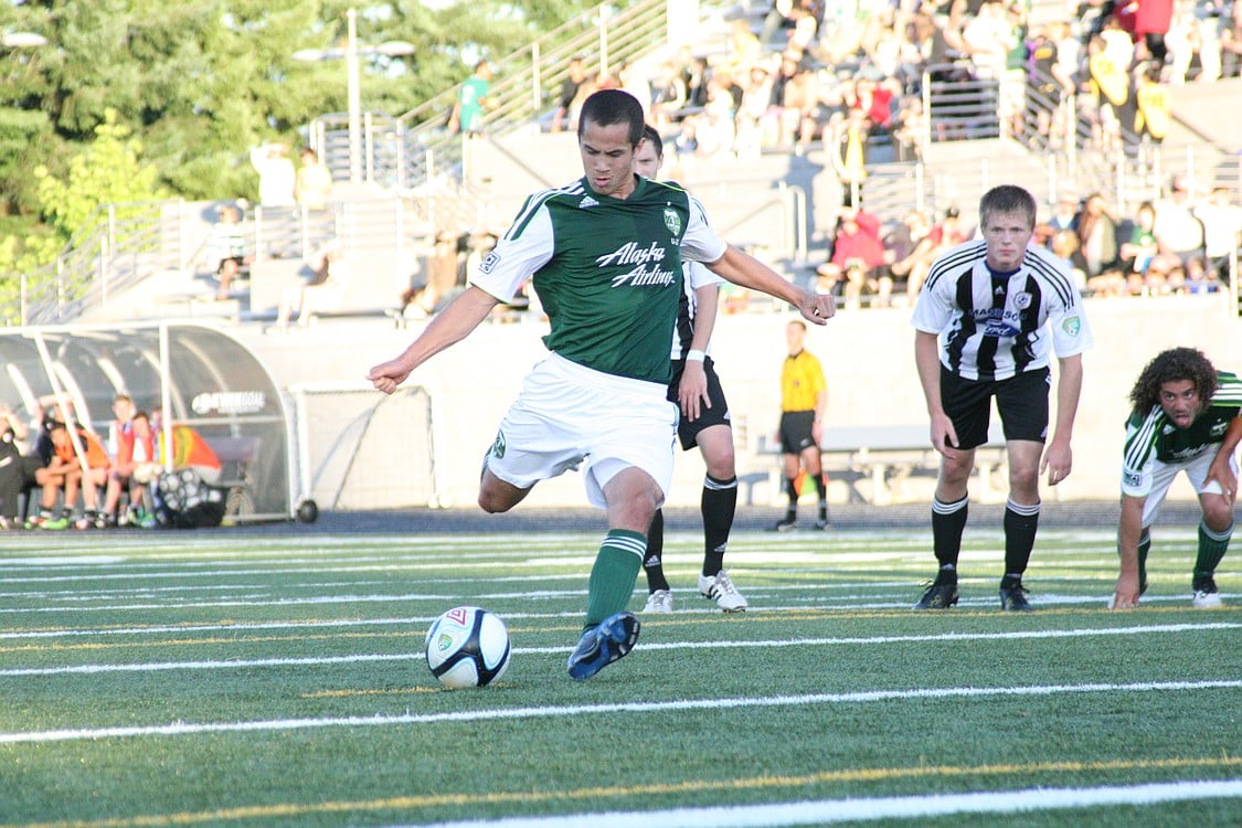 Brent Richards shoots and scores for the Timbers.