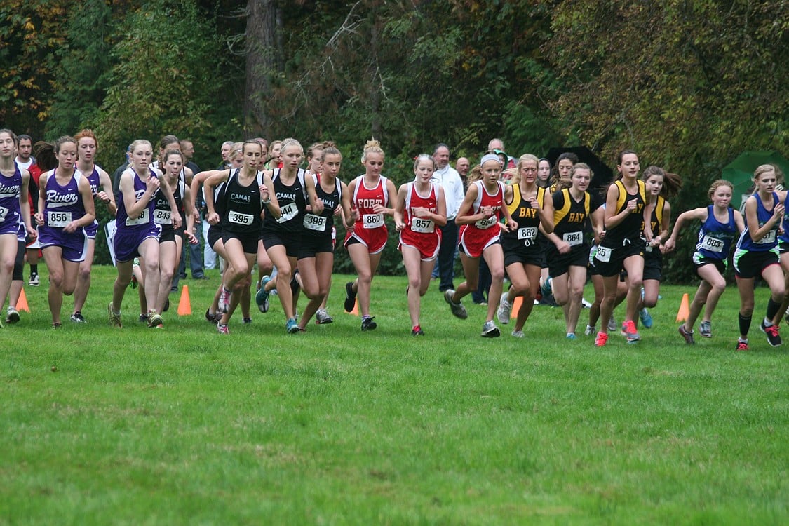 The gun goes off to start the 3A district girls championship race.