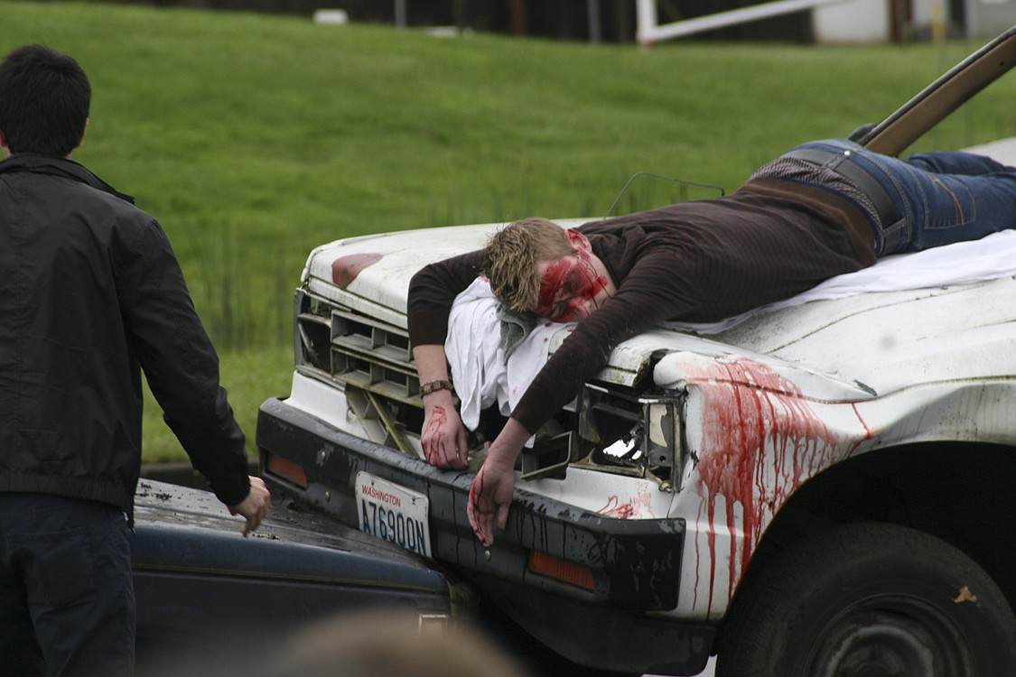 Camas High School senior Blake Wales portrays a student who has just been killed after he rode with a friend who had been drinking alcohol. The actors included Ali Fox as the drunk driver and Taylor Williams as a sober driver who was paralyzed from the neck down after being hit in the head-on collision with Fox.