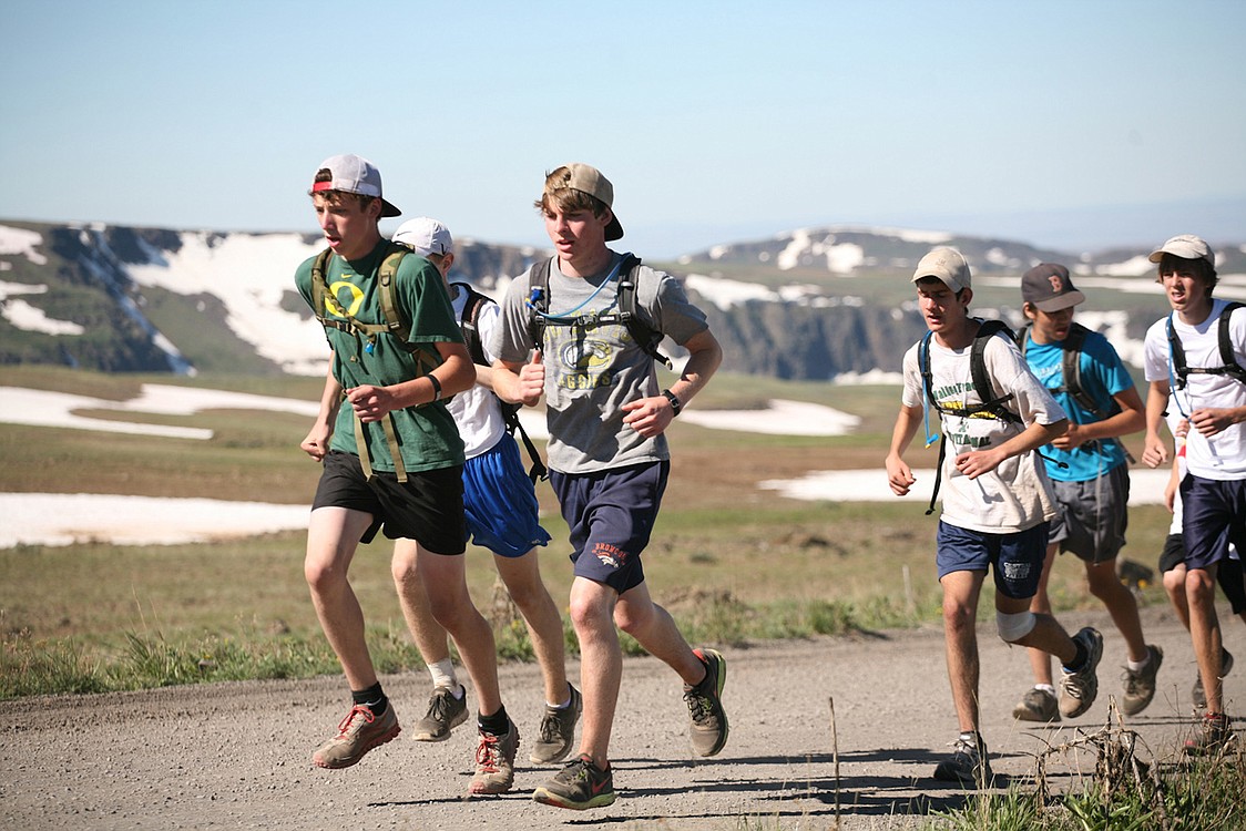 Washougal High School junior Sean Eustis (center) and his teammates traverse Steens Mountain on a cross canyon expedition.