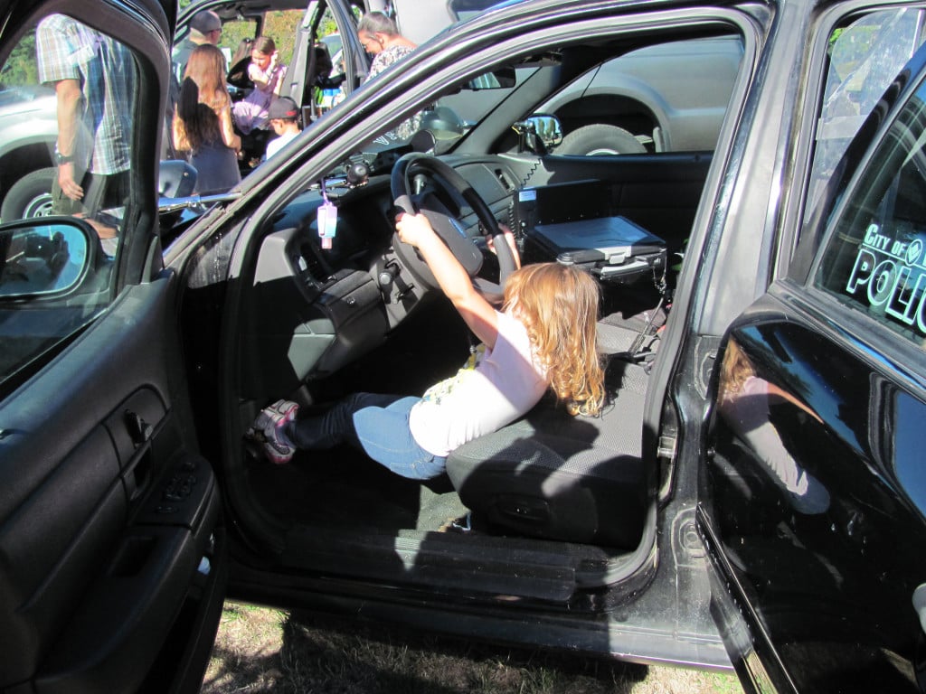 Children who attended the Girl Cops are Awesome event had the opportunity to explore inside police cars, as well as talk with female officers and tour the precinct. 