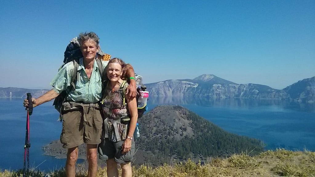 Dave and Boni Deal pose for a photo at Crater Lake, Ore., one of the highlights of their four-week across the Cascade Mountain Range in Oregon.