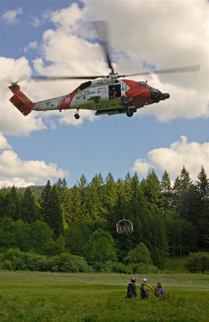 Silver Star Search and Rescue members participate in a training exercise at Camp Bonneville with a U.S. Coast Guard helicopter. 