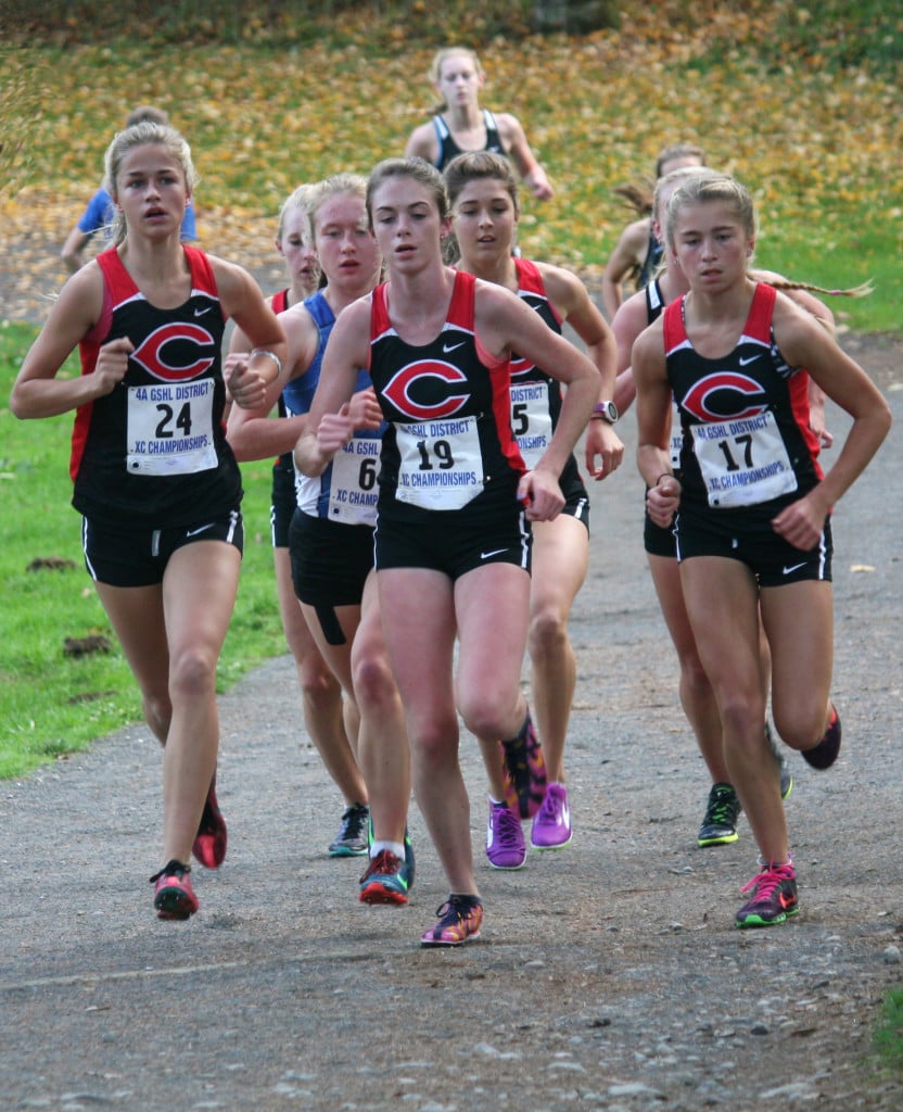 The Camas girls cross country team won the 4A bi-district championship meet by 71 points Saturday. Emma Jenkins (19) finished in first place, Rachel Blair (17) took third place, Emily Wilson (24) earned fifth place, Maddie Woodson notched ninth place and Ellie Postma placed 12th.