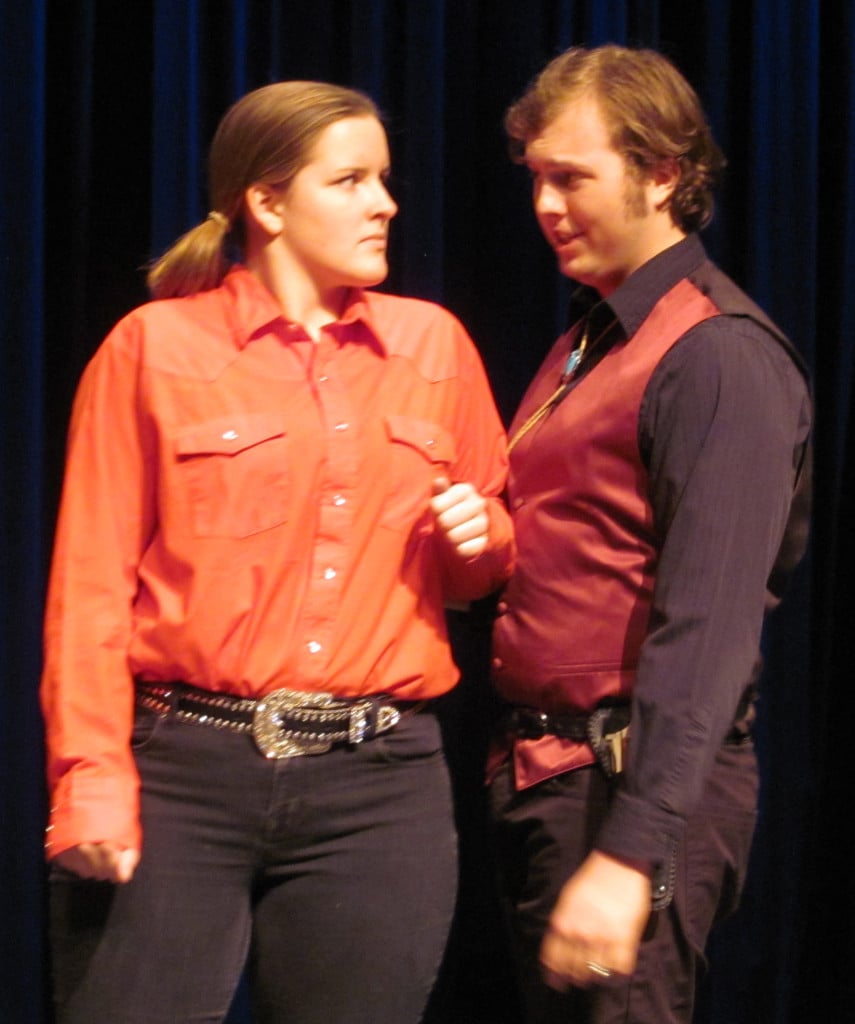 Katherine (Keira Stogin) and Petruchio (Tristan Fackler) have a tense first meeting.