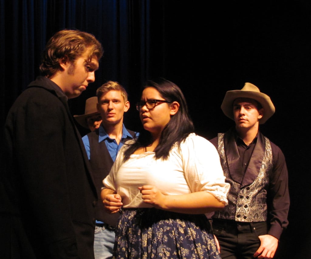 Petruchio (Tristan Fackler) and Senora Baptista argue while Lucentio (Carson Connors) and Gremio (Corbin Jones) look on in amazement.                               