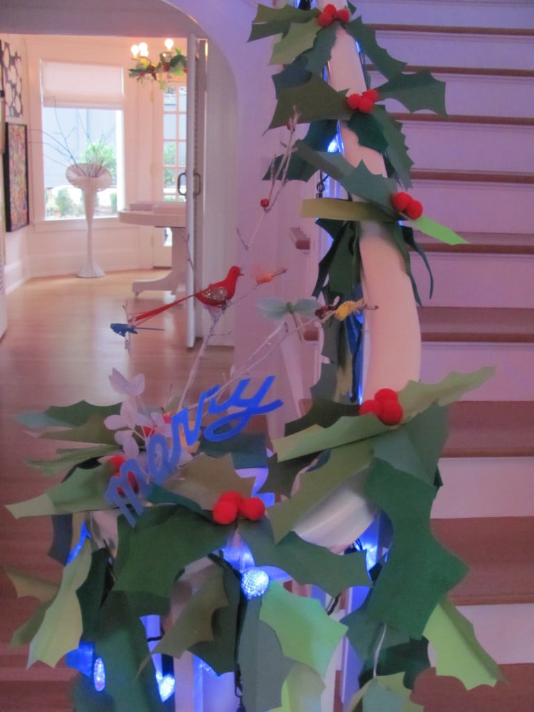 Terri Shanahan created the holly and lights which are wrapped around the main stairway in their historic 1923 home at the edge of downtown Camas. 