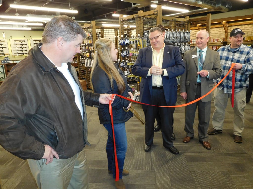 Ribbon cutting participants, to commemorate the opening of Safefire Indoor Shooting Range & Retail Sales, included (left to right) Matt Olson, president of Robertson & Olson Construction, Inc.; Danna Olson, owner of Safefire; Camas Mayor Scott Higgins; Camas-Washougal Chamber of Commerce Executive Director Brent Erickson, and Chad LeDoux, with Robertson & Olson. ìI have grown up in a family that is both passionate about firearms safety and business,î Danna Olson said. ìI have many great mentors in both industries that have helped mold the experience I have today.î 