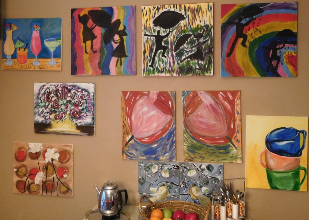 Kathy Dering  has several of her paintings hanging in her art room. She began using acrylics after a spinal cord injury to help her regain use of her fingers.