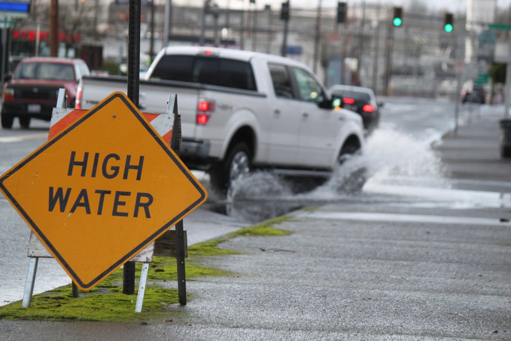 Pools of rainwater collected on some portions of Northeast Third Avenue in Camas, following periods of heavy rain during the past few days. Additional precipitation and high winds are predicted for this week. Rainfall for the month of December is expected to surpass 14 inches.