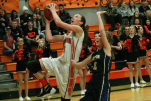 Beyonce Bea glides to the hoop to score two of her team-leading 17 points for Washougal Dec. 29, in the Panther Pit. Washougal defeated Seton Catholic 50-30.