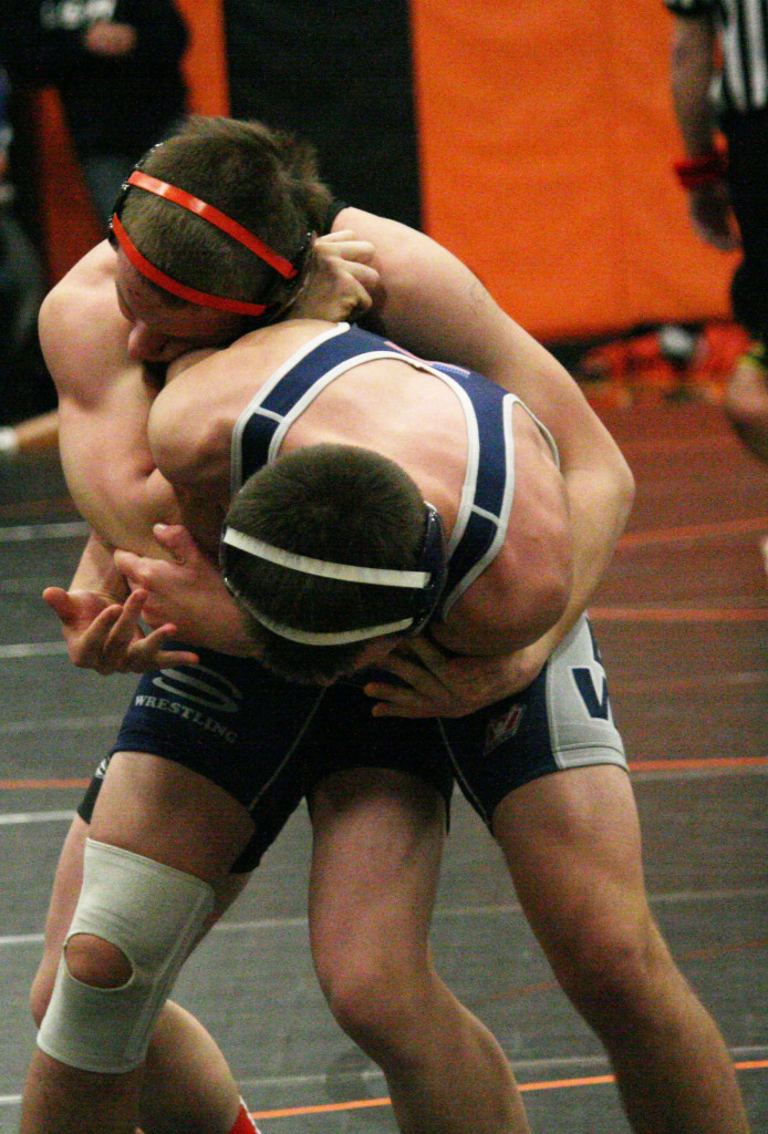 Washougal wrestler Taylor Leifsen puts the squeeze on Skyview's Jackson Sayler during his semifinal match at the Washougal River Rumble. Leifsen captured the 152-pound championship medal.