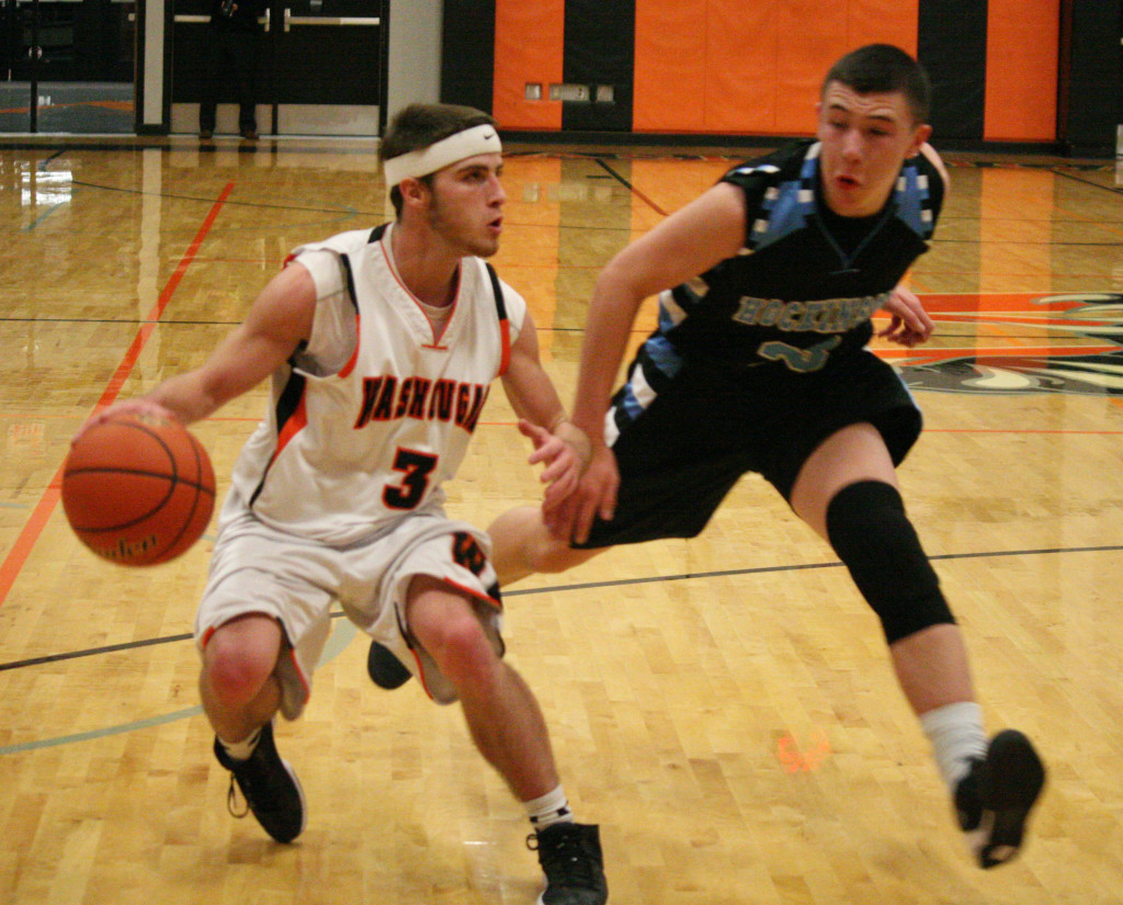 Daniel Davis (left) ignites the offense for the Washougal boys basketball team against Hockinson Monday. The high school senior also helped the Panthers beat Woodland in overtime Friday by stealing the ball and draining a 3-pointer at the buzzer. "It was my favorite game I've played in my four years here," Davis said. (Dan Trujillo/Post-Record)