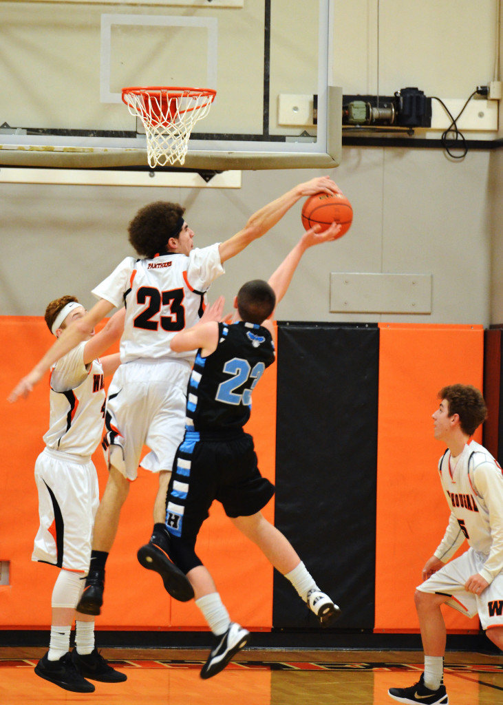 Matt Rotundo blocks a Hawk Monday. The Washougal boys beat Hockinson 57-45 to secure their fourth victory in a row. (Photo courtesy of Kris Cavin)