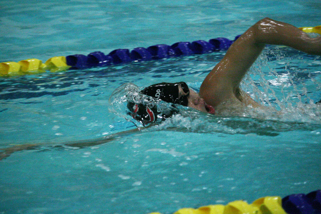 Camas sophomore Mark Kim broke a 43-year-old Kelso High School swimming pool record Saturday, when he won the 500-meter freestyle district championship with a time of 4:37.43. He also set a meet record time of 1:44.93 in the 200 freestyle event. 