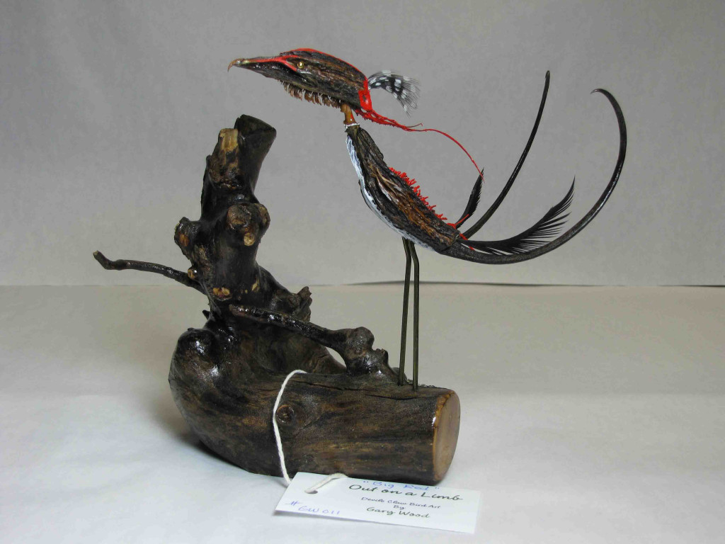 Gary Wood uses seed pods from a plant called "devils claw," that grows in the southwest desert, to create artistic birds using various feathers to enhance them. His work, and that of his wife Judith Sanders-Wood, a painter, is being featured this month at Camas Gallery. (Contributed photo)