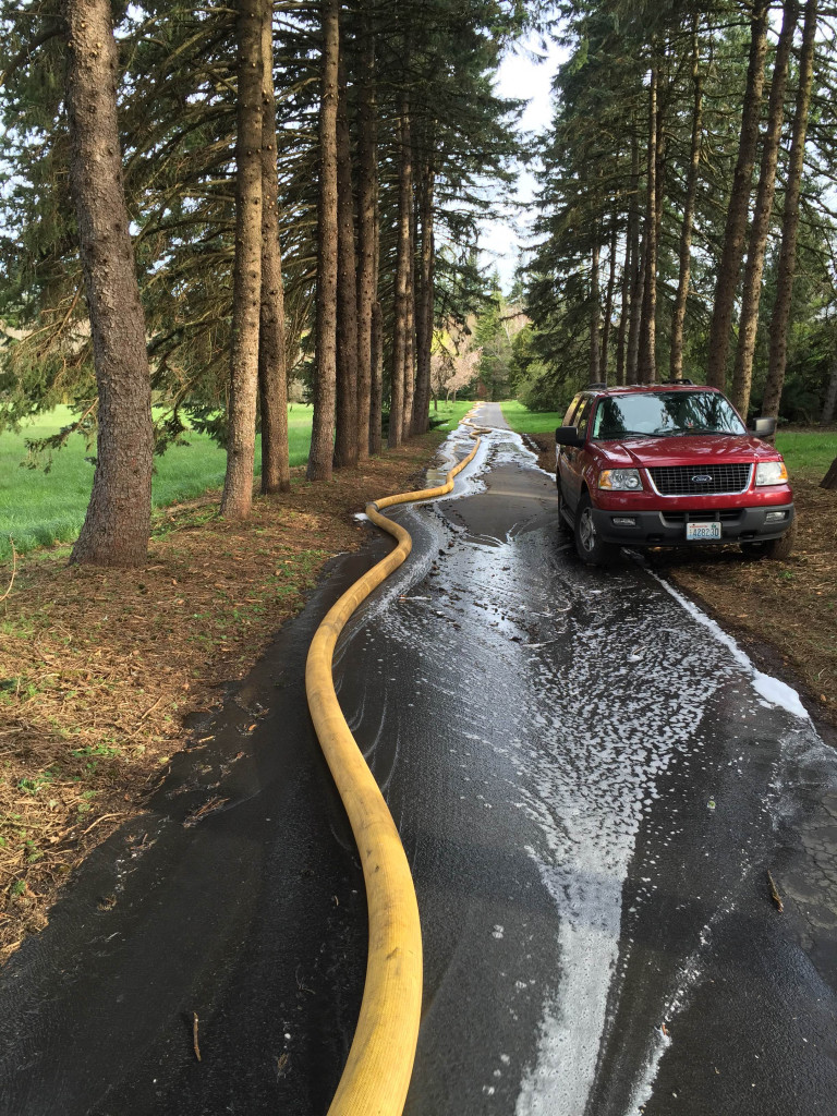 1,500 feet of hose was needed to get water to the scene of a garage fire Friday morning. The blaze was discovered by the attached home's two residents. Photo courtesy of the CWFD.
