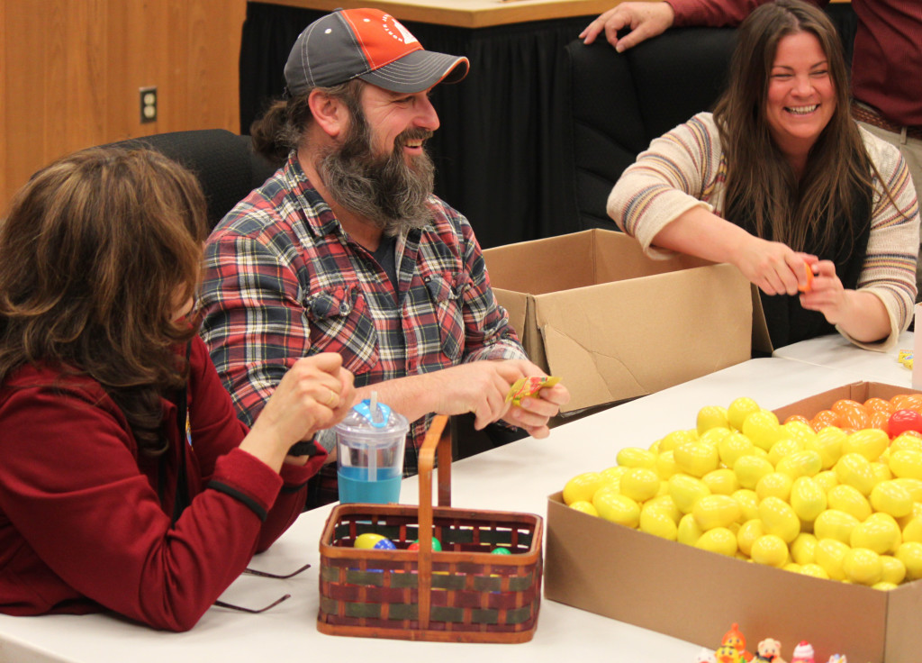 Rose Jewell, Matthew Buitron and Maymay Buitron (left to right) help fill brightly colored plastic eggs with candy during a work party at Washougal City Hall on Friday afternoon. The eggs will be the main attraction during the Downtown Washougal Association's EGGstravaganza event set for Wednesday at Reflection Plaza.