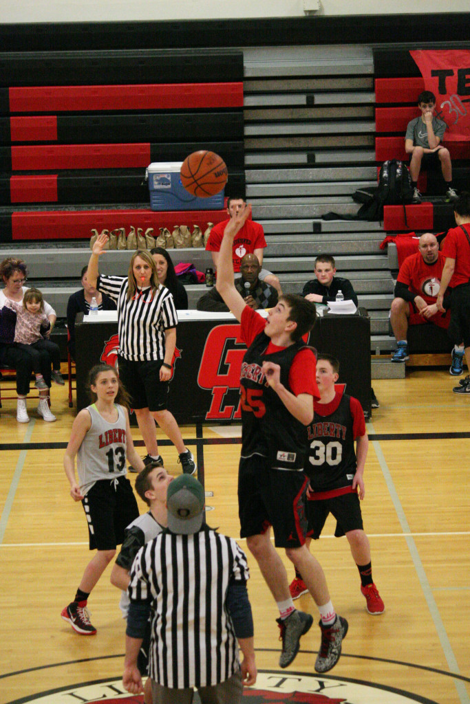 Terry Porter calls the action during Tuesday's Hoops for Heart March Madness event, at Liberty Middle School in Camas.