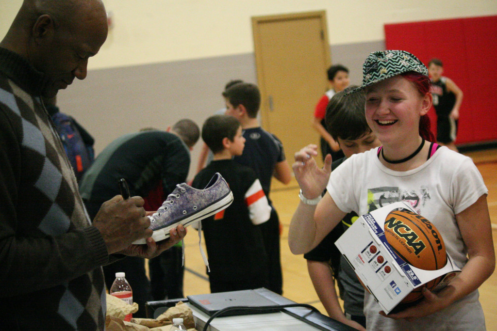 Terry Porter spent three hours in Camas Tuesday signing autographs and announcing basketball games at Liberty Middle School. 