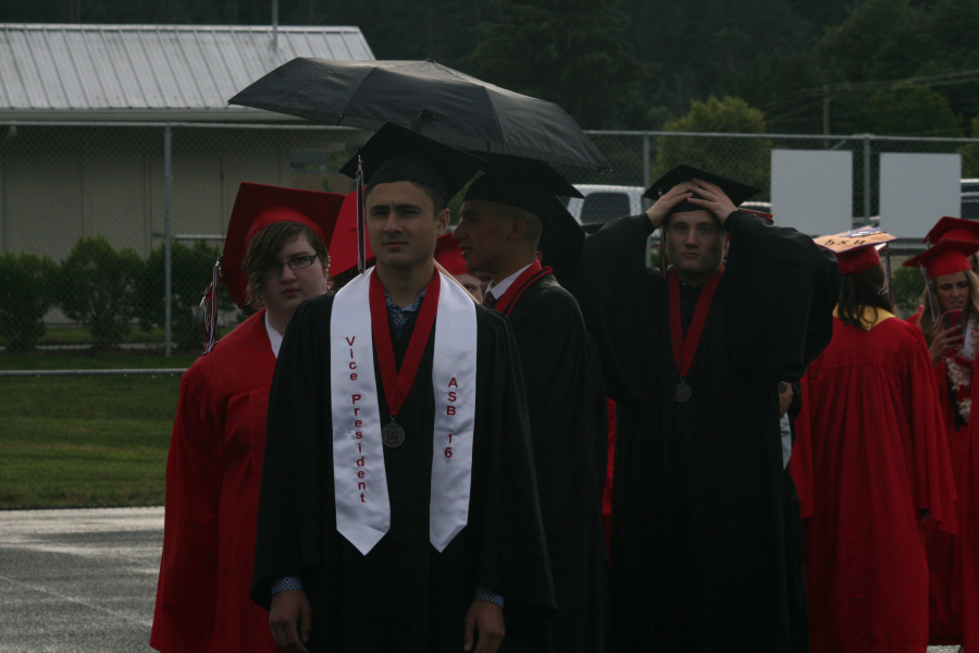 CHS Associated Student Body vice-president Daven Sharma and other classmates were prepared for stormy weather, but the skies cleared just as commencement began Friday night. 