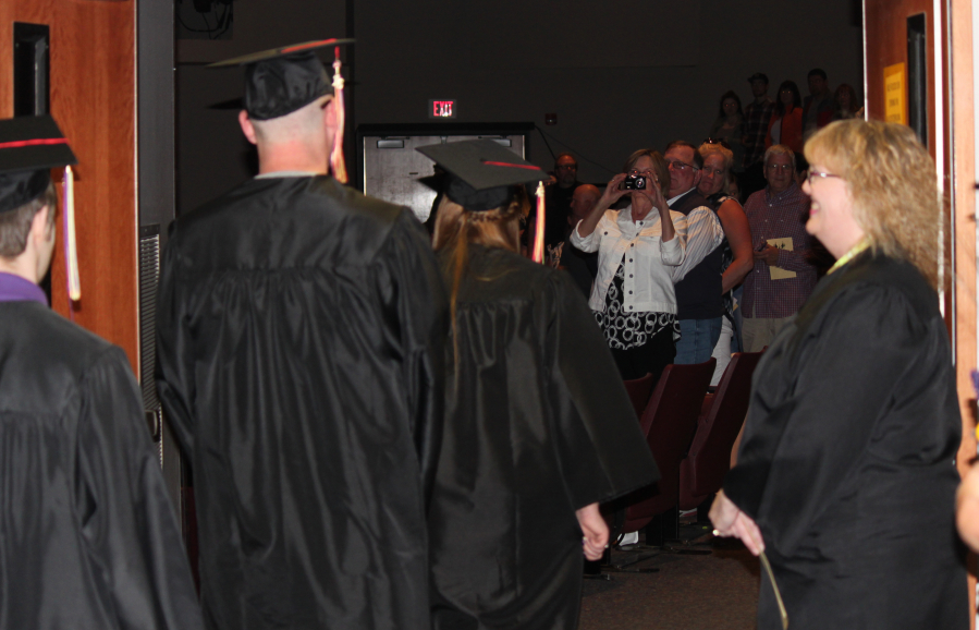 Proud friends and family members snapped pictures as the Excelsior High School graduating seniors filed into the Washburn Performing Arts Center to receive their diplomas on Friday. 