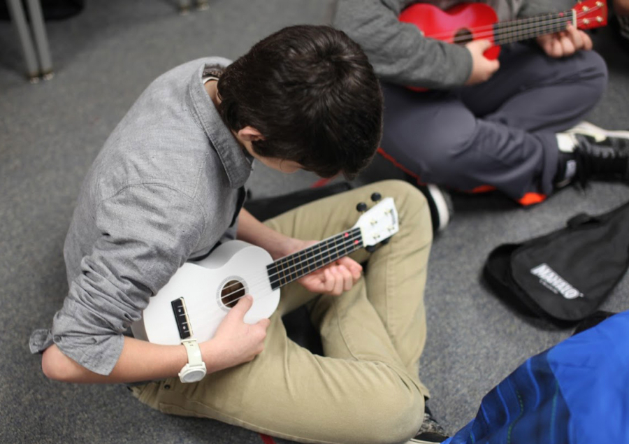 Learning to play the ukulele can open the door to learning other string instruments such as guitar.