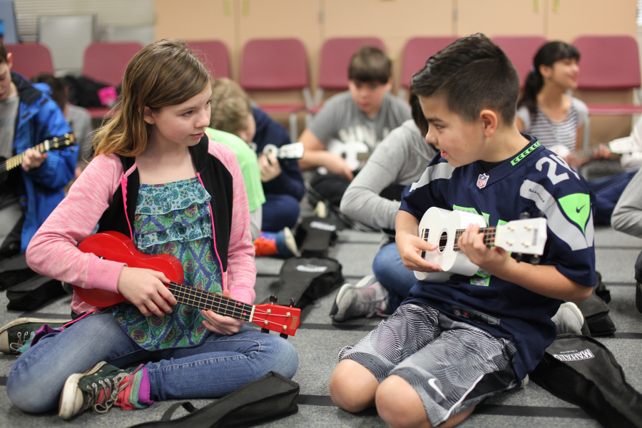 Hathaway Elementary School fifth-graders collaborate on projects with their ukuleles, and even have a virtual classroom set up, where they can practice outside of school.