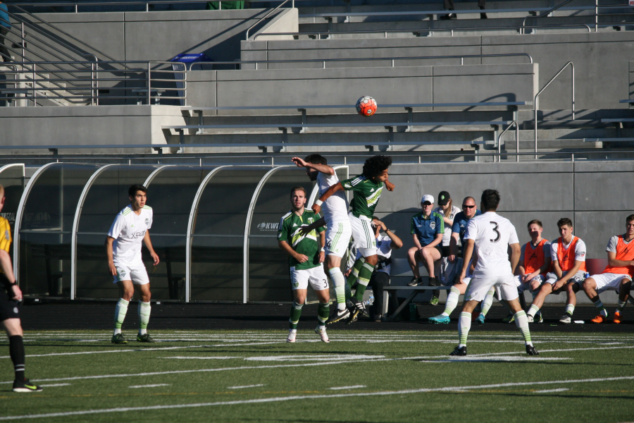 The Portland Timbers U23's Josue Chavez goes up for a header against the Seattle Sounders U23 team. (Matthew Svilar/Post-Record)
