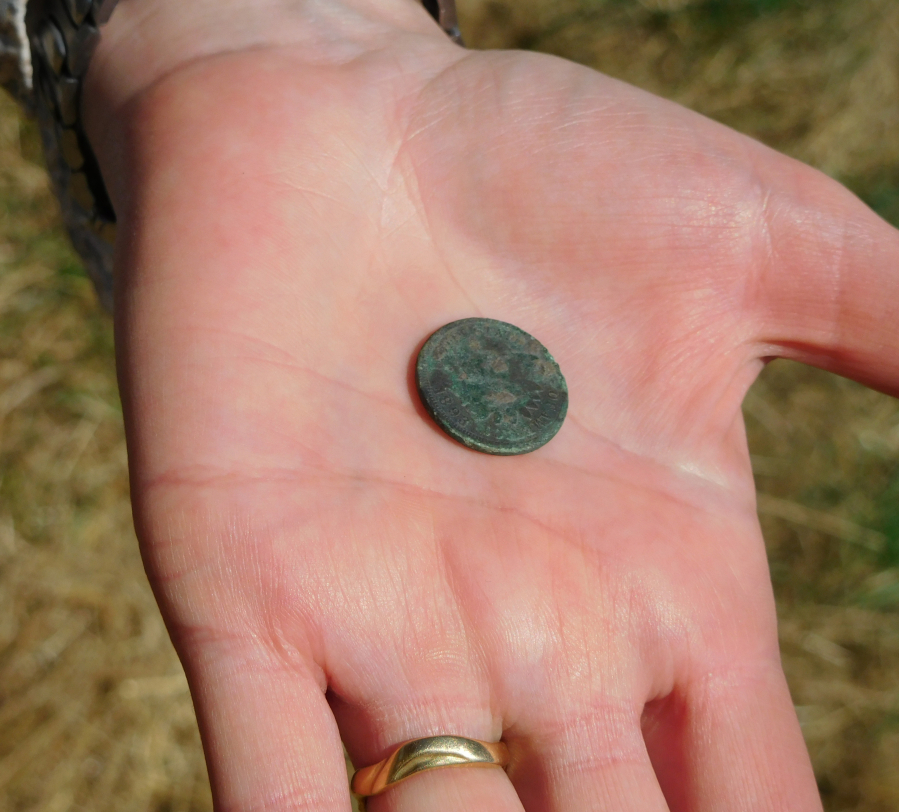 One of the biggest finds student archeologists have uncovered this summer is this Indian Arrowhead 1893 penny, found just below deposits from the 1894 flood.