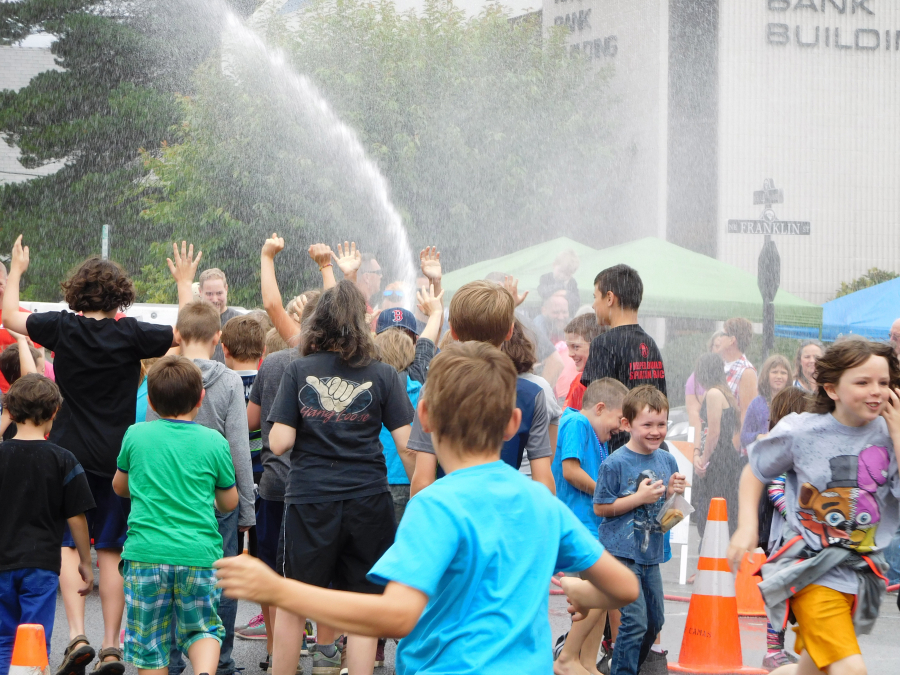 In-between rounds of bathtub races, Camas-Washougal firefighters turned their hoses on for some good, old-fashioned fun. The sun came out just in time to make the cold water enjoyable.