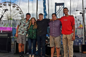 Simply 8 was formed in February out of a desire to produce music that is meaningful and contains lyrics that everyone can enjoy. Here, band members relax after a performance at the Clark County Fair. 