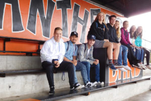 These Washougal High School students were among more than 30 who came to Fishback Stadium Sunday afternoon to paint over damage after it had been vandalized.