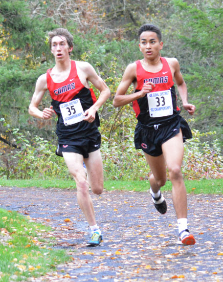 Yacine Guermali (right) grabbed first place and Daniel Maton took second place at districts and regionals to help the Camas boys team win both meets.