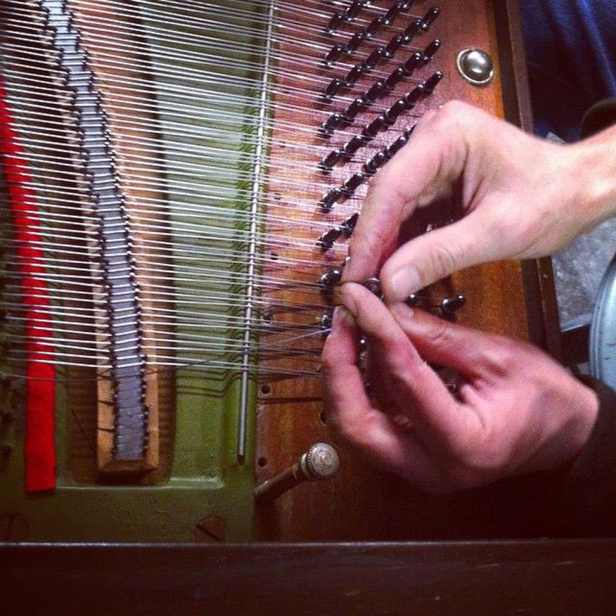 Furniss works on learning piano repair during his time at The School of Piano Technology for the Blind, where he met his wife,  Anni. (Anni Furniss/Contributed photo)