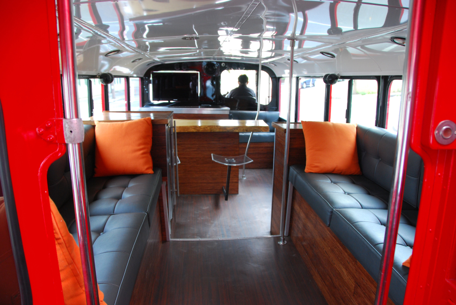 The downstairs of the double decker bus includes leather upholstery and bar style seating. (Contributed photo)