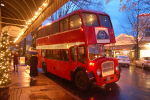 This double decker bus, owned by Camas residents Minda and Kevin Coombs, will once again be a highlight at the Holiday Sip and Shop Thursday, Dec. 8. (Contributed photo)