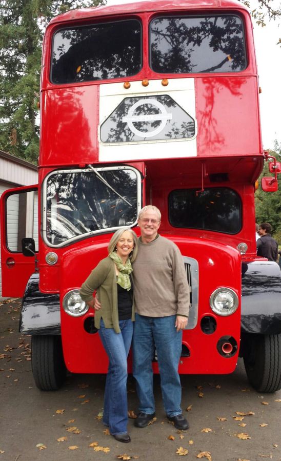 Minda and Kevin Coombs of Camas purchased Double Decker PDX in April 2015. Behind them is 'Candy,' a 1959 Bristol Lodekka. (Contributed photo)