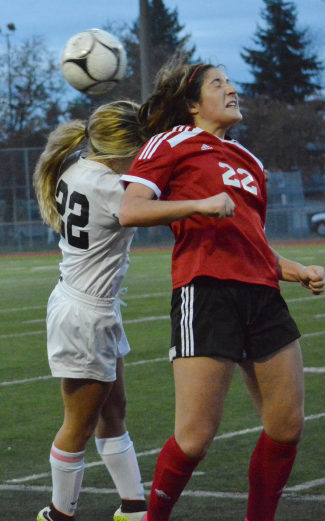 Alyssa Tomasini nudges the soccer ball forward at the start of the championship game Saturday. She scored the winning goal for the Papermakers in a 1-0 victory against Skyline in the semifinals Friday.