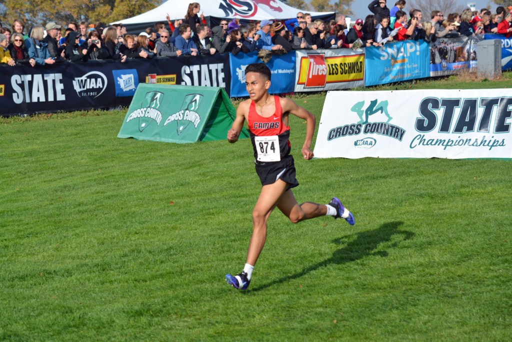 Yacine Guermali clinched the 4A boys state cross country championship for Camas Saturday, on the Sun Willows Golf Course in Pasco.