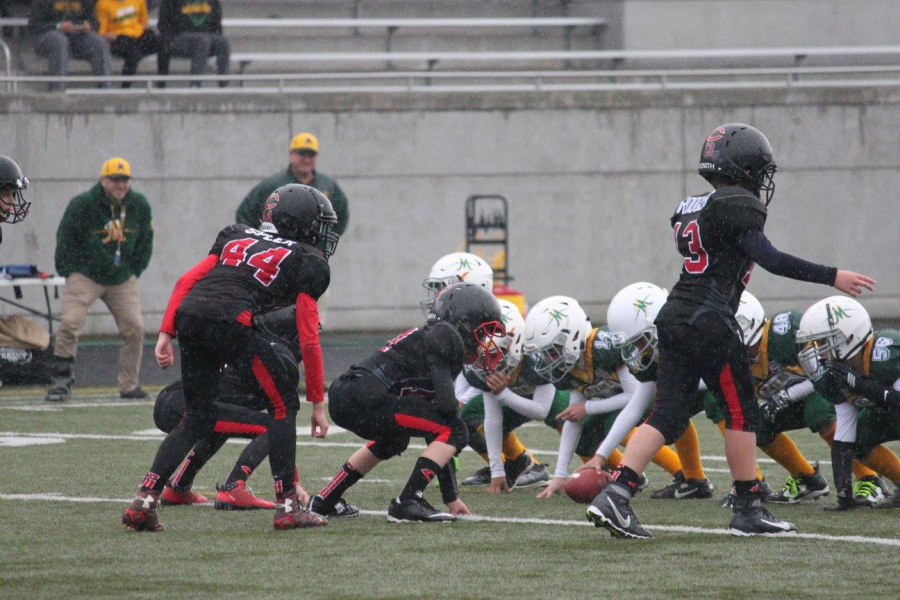 The Camas Jets line up against the Reno Miners in the Pacific Northwest Pop Warner regional championship game Nov. 20, at Doc Harris Stadium, in Camas. The Jets won 36-12 to earn a trip to the Pop Warner Super Bowl, in Orlando. (Contributed photo)