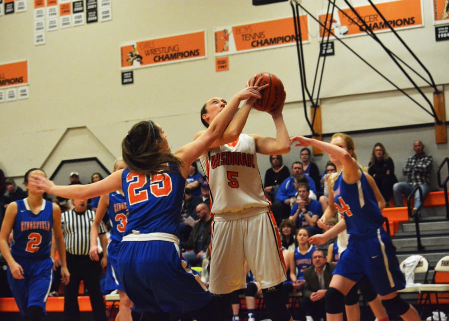 Beyonce Bea netted 19 points and grabbed 13 rebounds to help the Washougal girls basketball team beat Ridgefield 54-41 Friday, at home. 