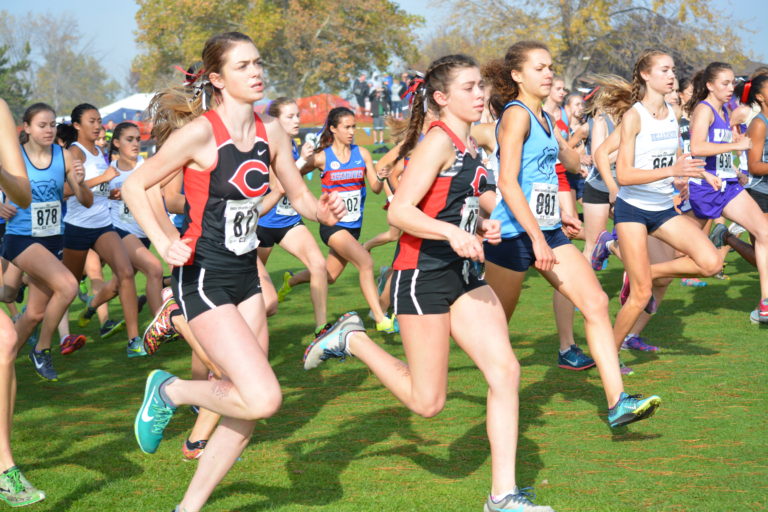 Emma and Halle Jenkins out in front for Camas at the start of the 4A girls state championship race.