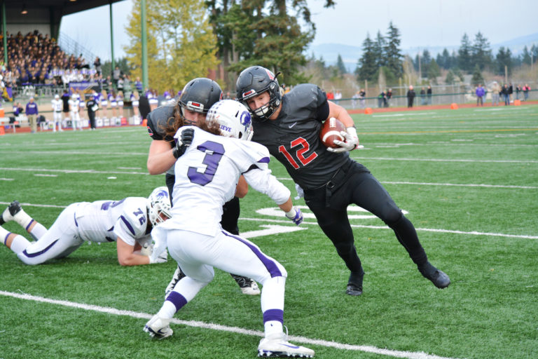 Dakota Napierkowski delivers a block for Michael Matthews.