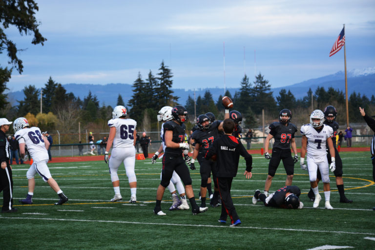 Will Schultz recovers a fumble for the Camas football team.