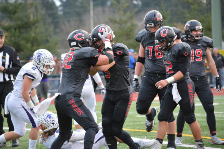 Michael Matthews celebrates his third touchdown of the game for Camas with Cooper McNatt.