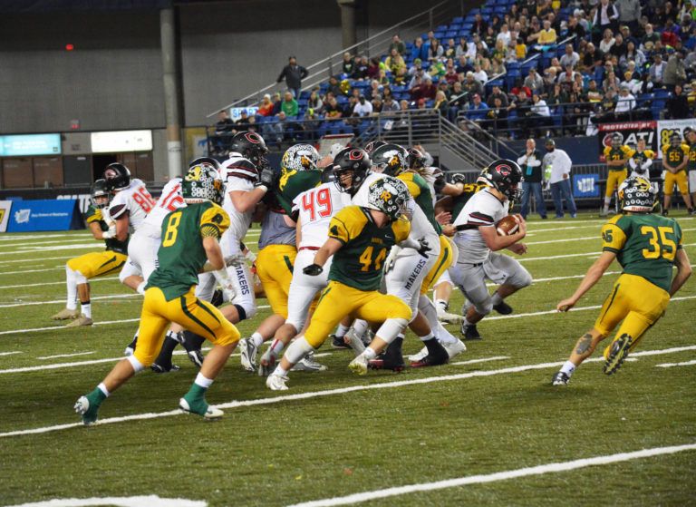 The Camas offense goes to work in the state championship football game at the Tacoma Dome.