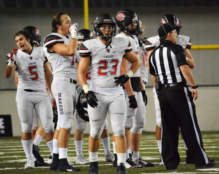 The Camas defenders remain focused during a timeout by Richland. Players facing from left to right are Tanner Howington, Cody Jackson, David Aarhus and Marshall McIvor.