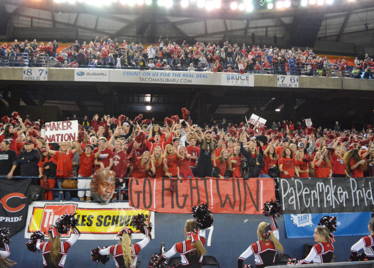 The Camas fans go crazy after the Papermakers won the state championship football game at the Tacoma Dome.